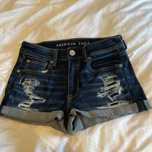Beautiful dark washed and slightly distressed denim shorts.